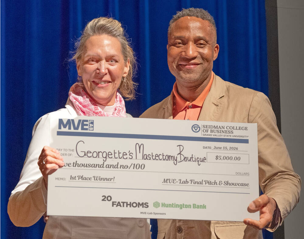 At left, Kasey Torres, first-prize winner, stands with Michael Hyacinthe, MVE-Lab lead instructor and ambassador.